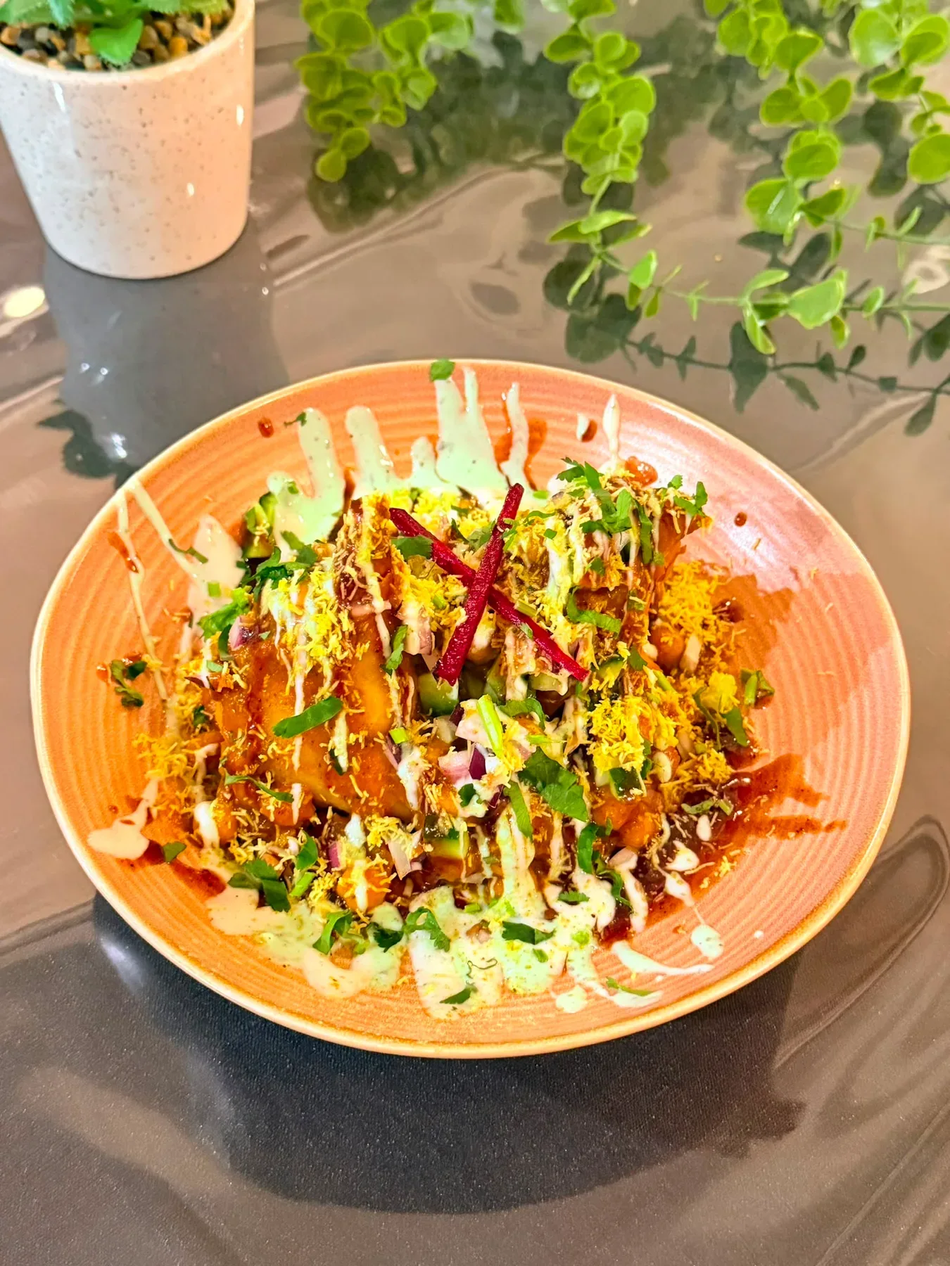 Samosa chaat served at TASSIE FLAME